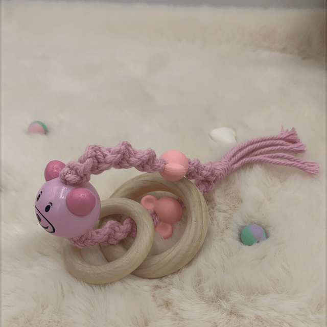 Anneaux dentitions rose avec perles 