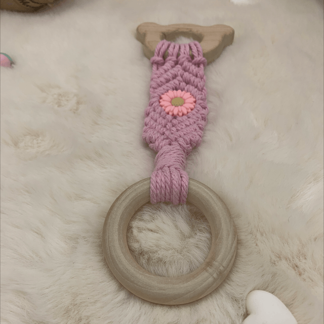 Anneaux dentitions rose avec fleur 