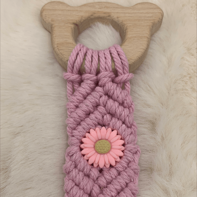Anneaux dentitions rose avec fleur 