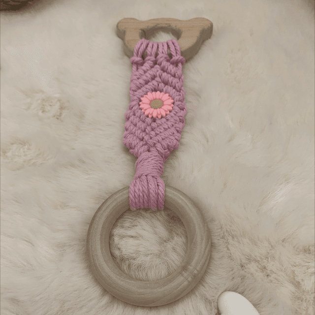 Anneaux dentitions rose avec fleur 