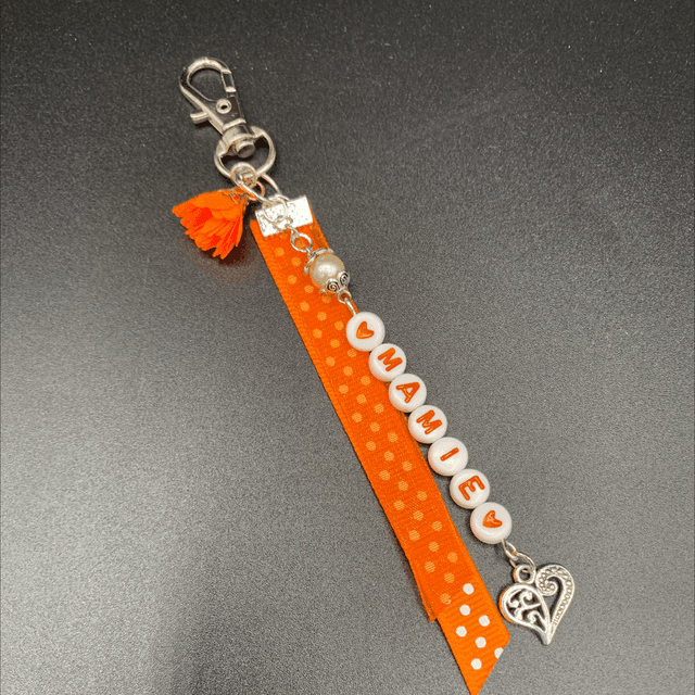 Bijoux de sac. Mamie orange point blanc 
